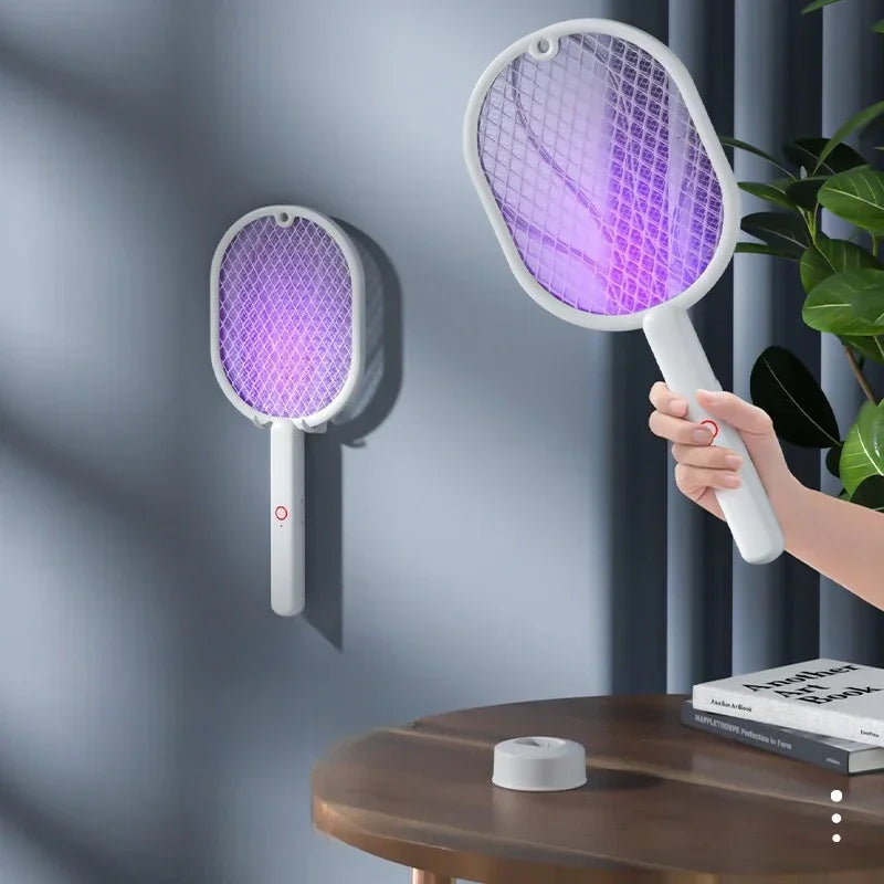Electric racket kills insects