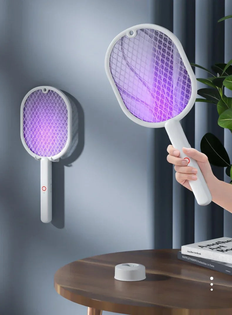Electric racket kills insects