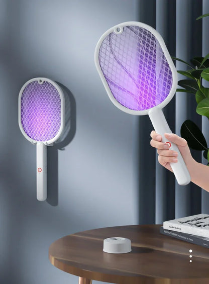 Electric racket kills insects
